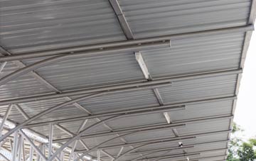 installing New Hartley metal roofing